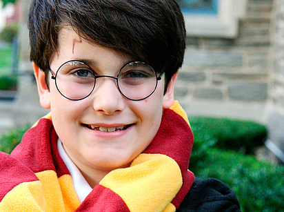 boy in Harry Potter costume